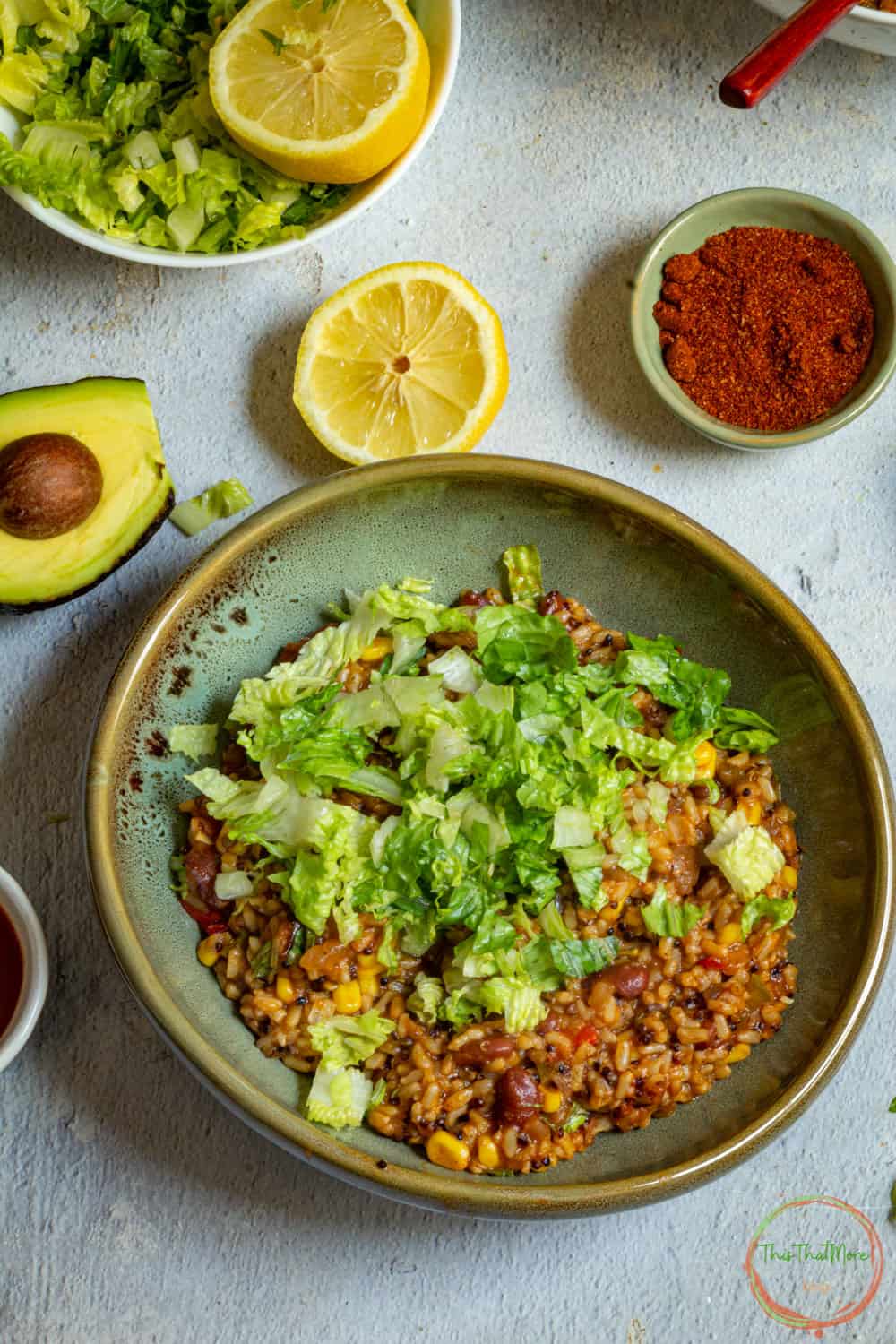 Instant Pot Vegan Burrito Bowl garnished with lettuce.