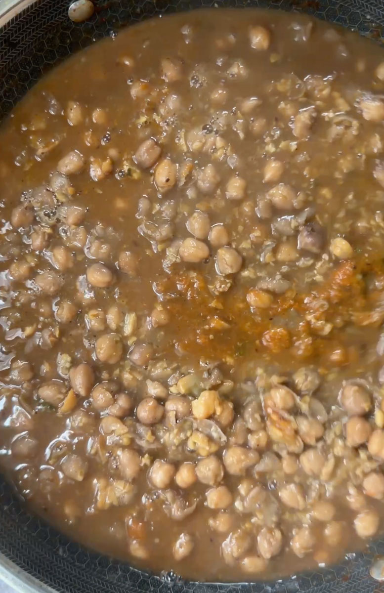 Add chickpeas to onion-tomato masala and cook.
