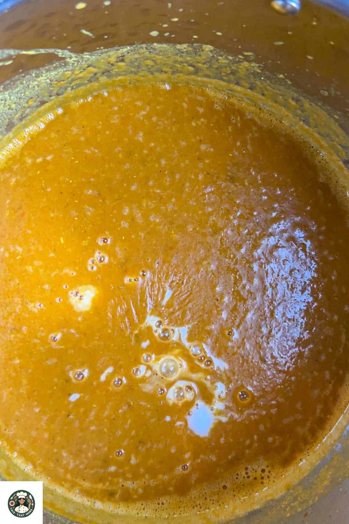 Image showing blended lentil soup with spiced carrots.