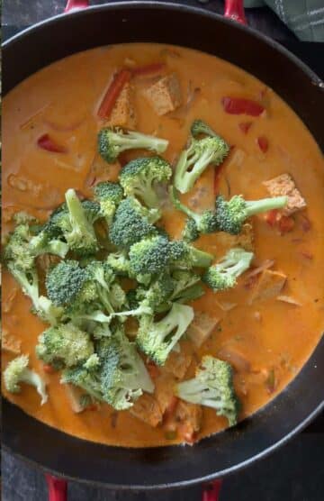 Once the curry is almost done, then add sturdy vegetables like broccoli, snap peas, etc.