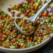 Charred corn chaat with vegetables and roasted peanuts.