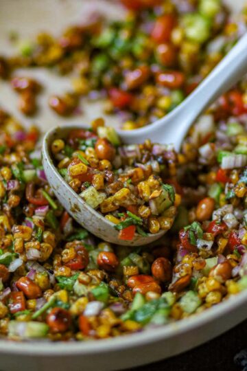 Charred corn chaat with vegetables and roasted peanuts.