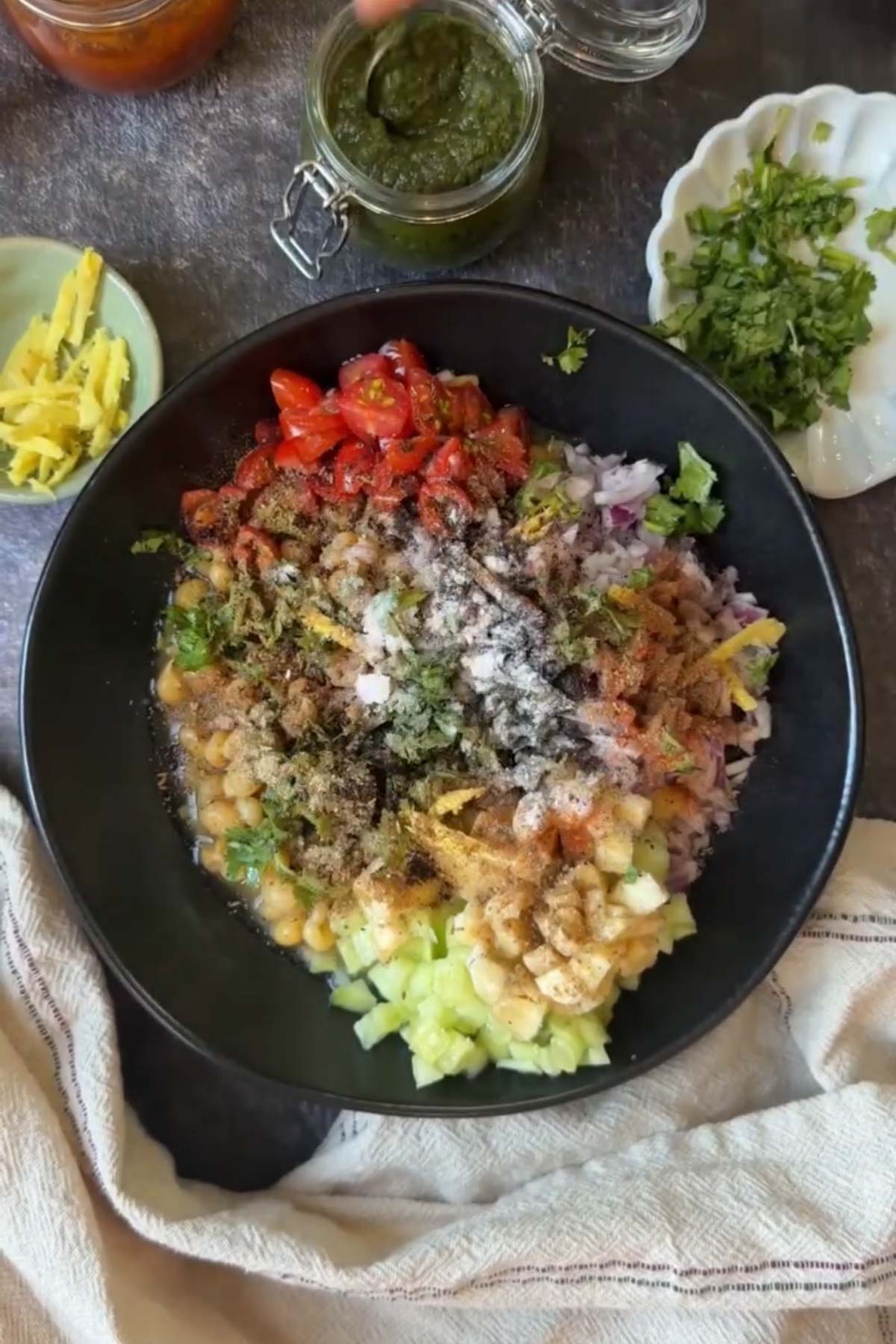 Spices added to white peas and vegetables for matar chaat