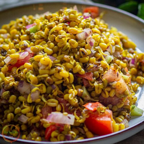 Sprouts chaat made with cooked sprouts, corn and vegetables.