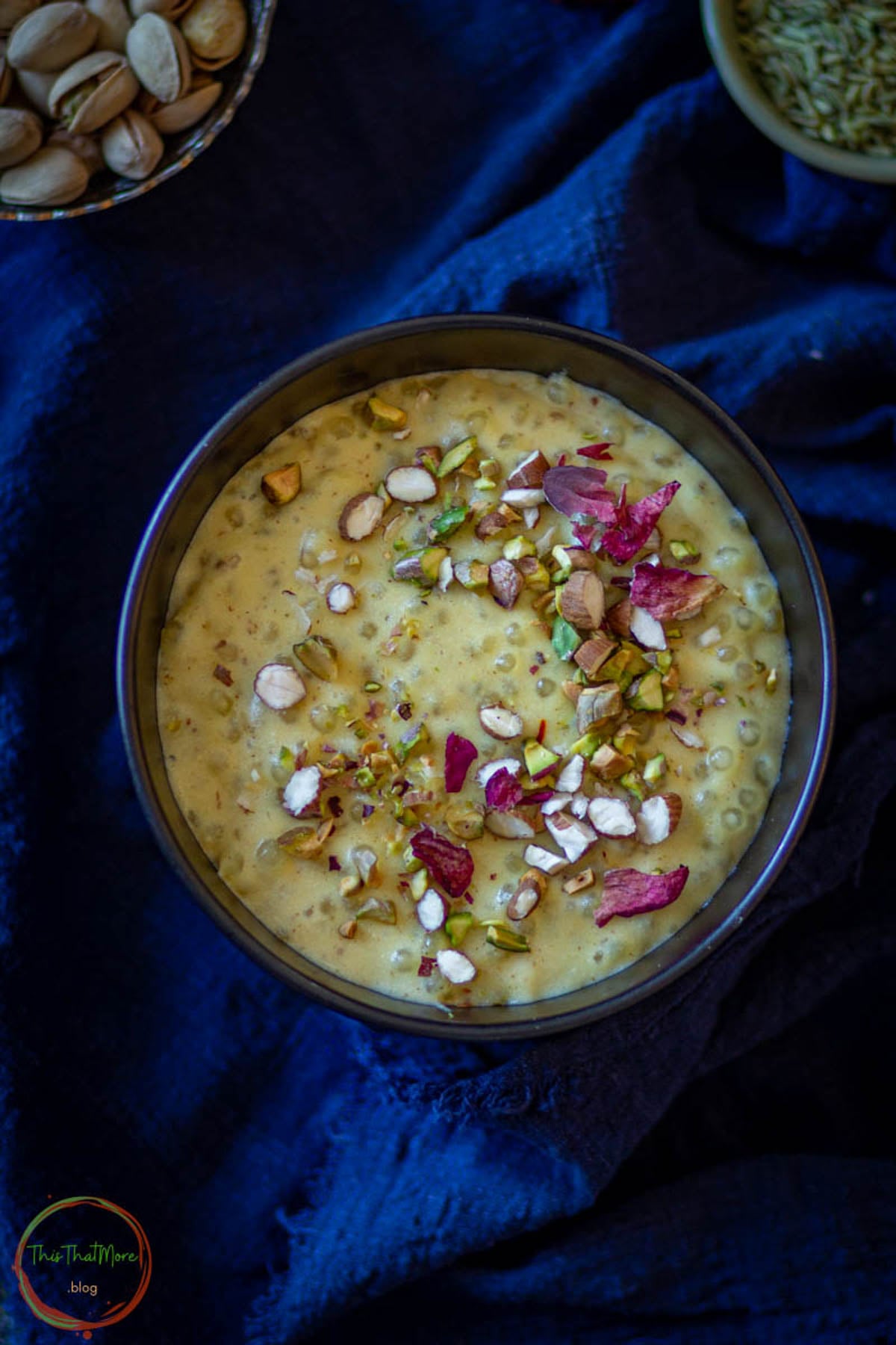 Sabudana kheer served in a bowl with chopped nuts.