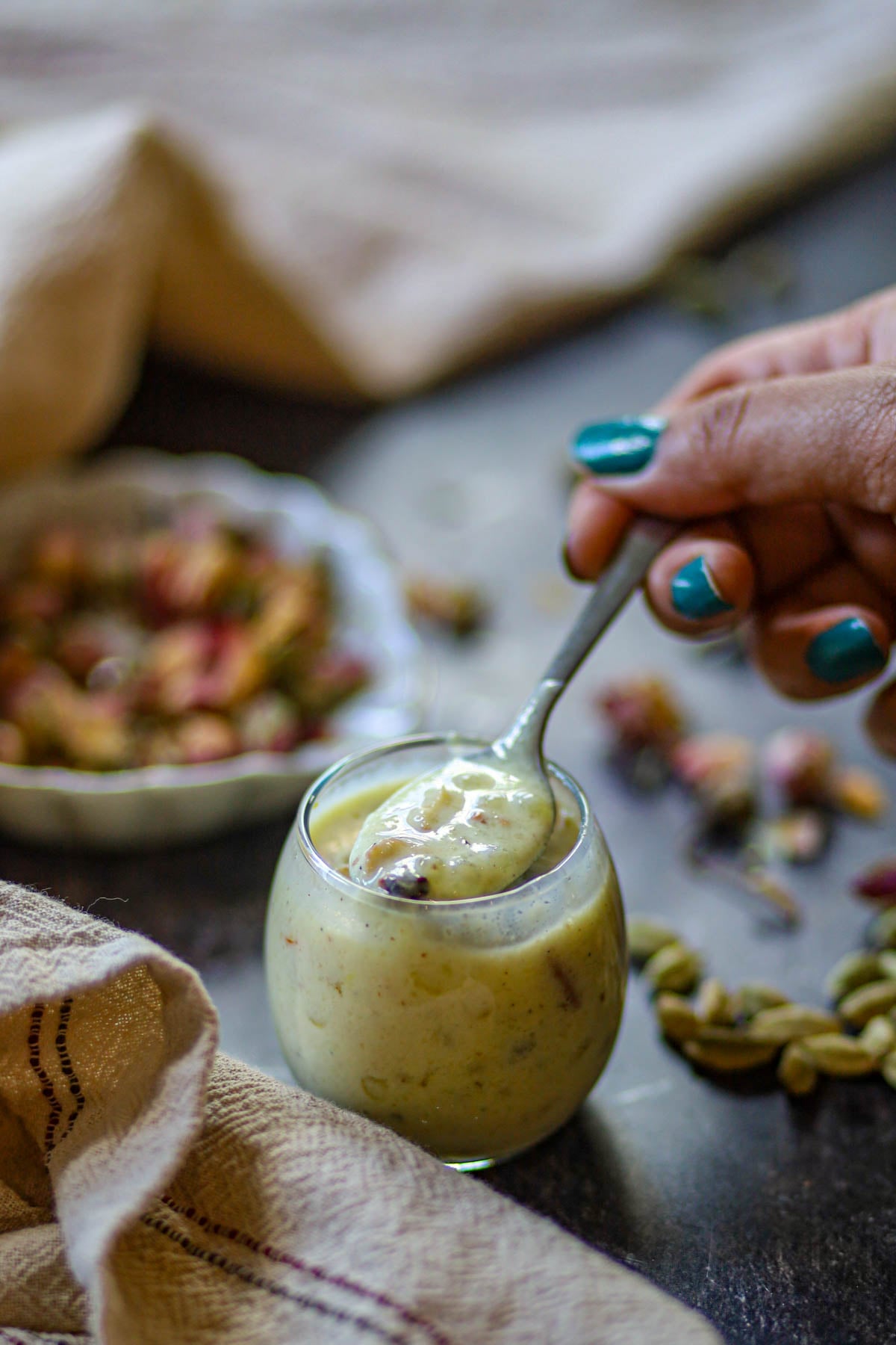 Spoonful of creamy sabudana kheer.