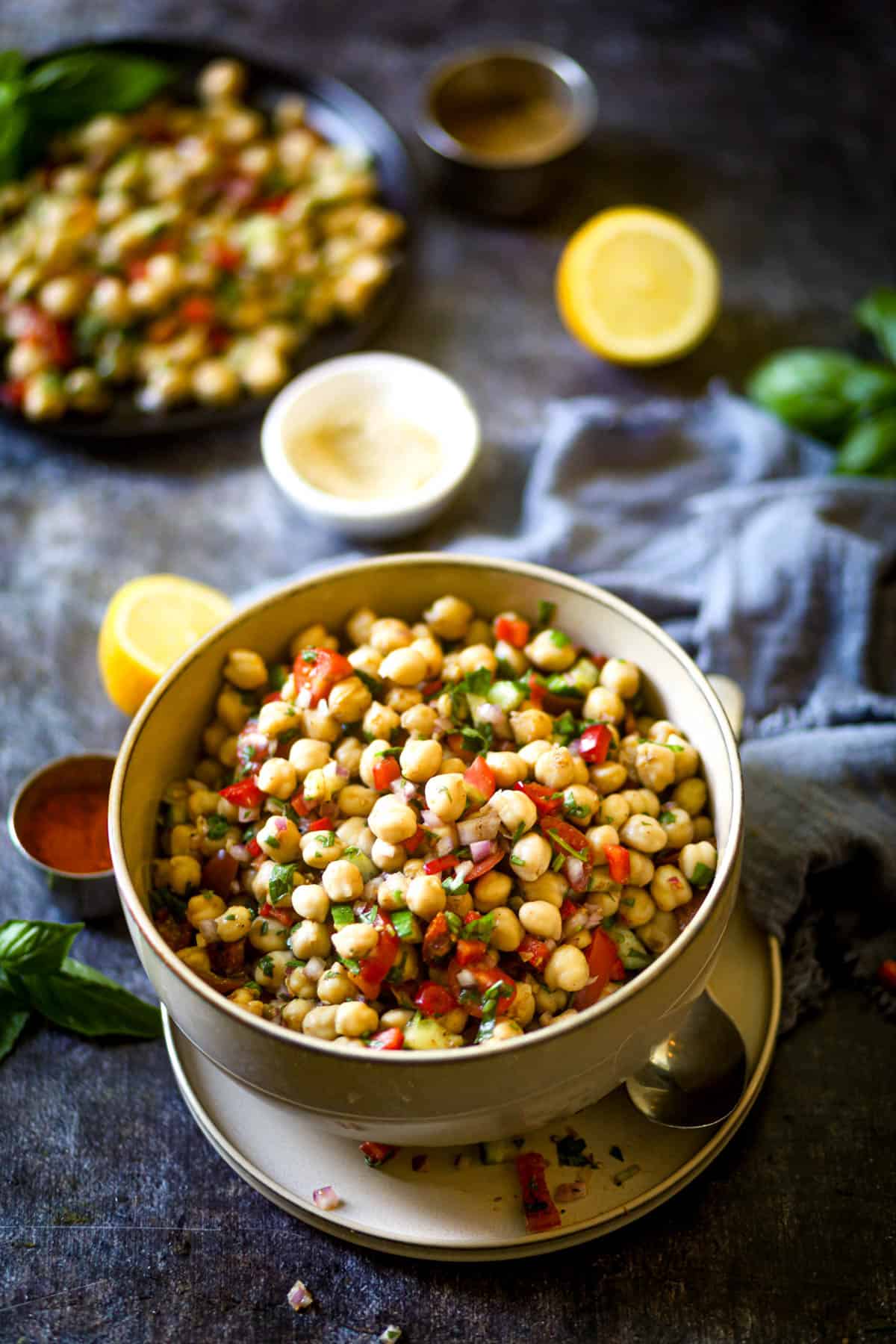 Indian chickpea salad in a brown bowl.
