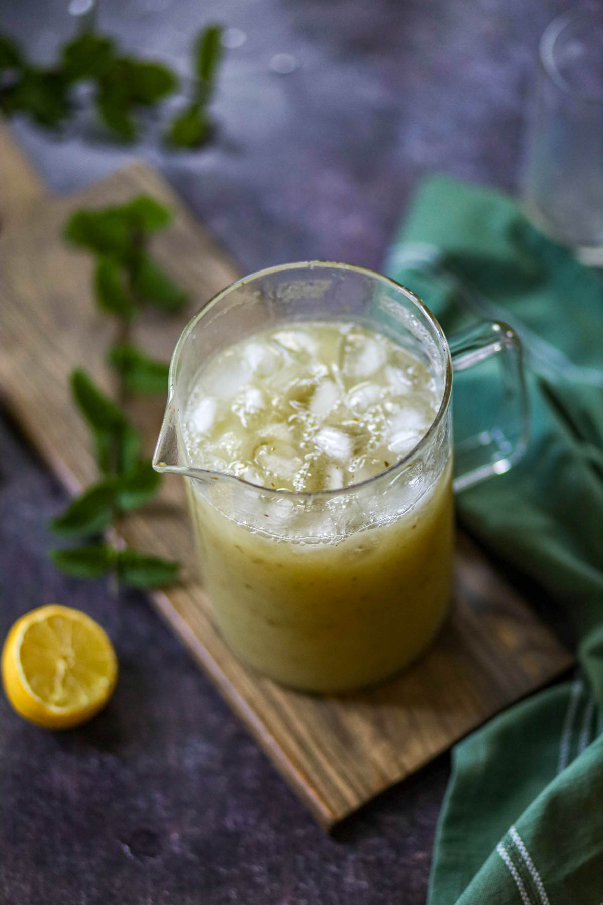 Pitcher of chilled aam panna with ice.