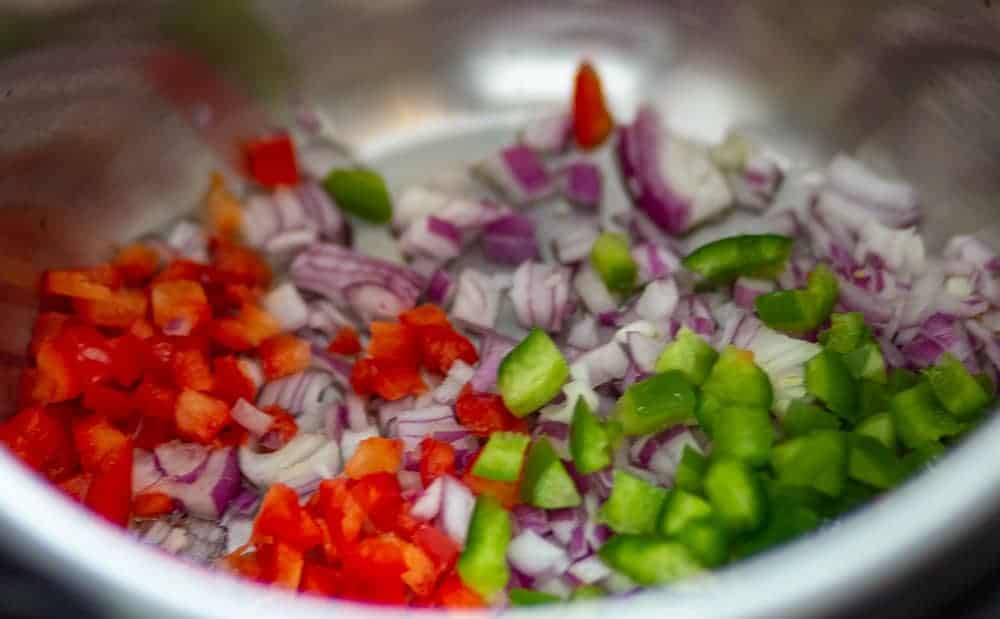 add onion, bell pepepr in the instant pot and saute