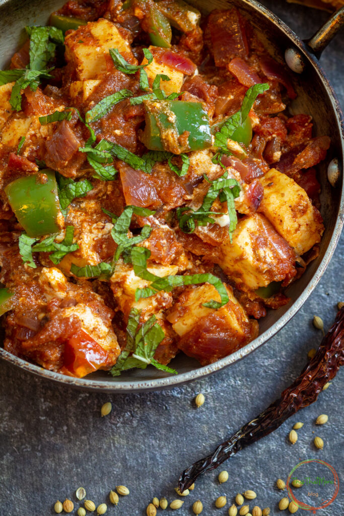closeup shot of Kadai Paneer in a wok.