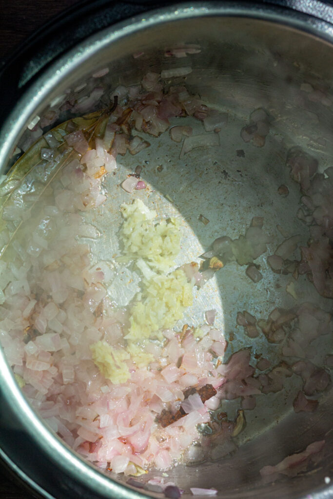 add ginger garlic paste and cook and saute for 1 more minute.