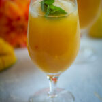 Peach Mango Tea served in a big glass.