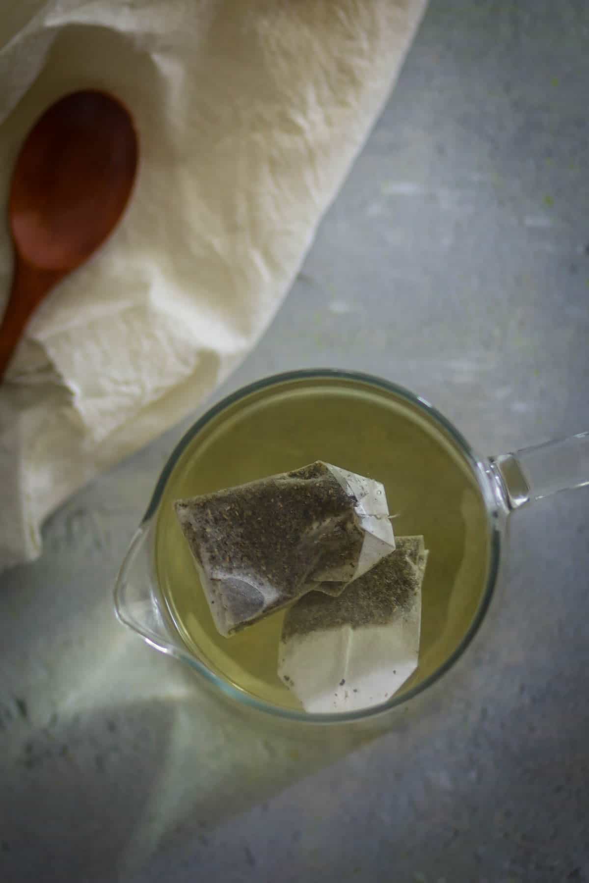 Add tea bags in the boiling water.