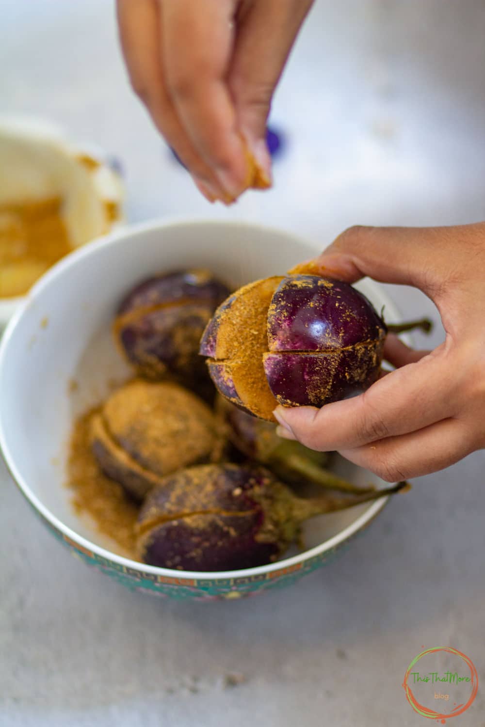 Add the spice-mix in the cavity of baingan.