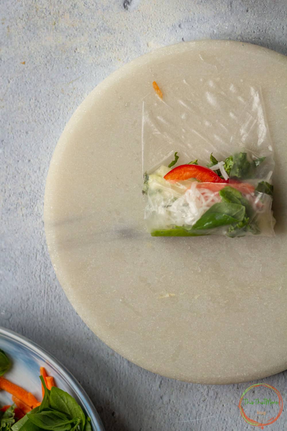 Start rolling the rice wrapper.