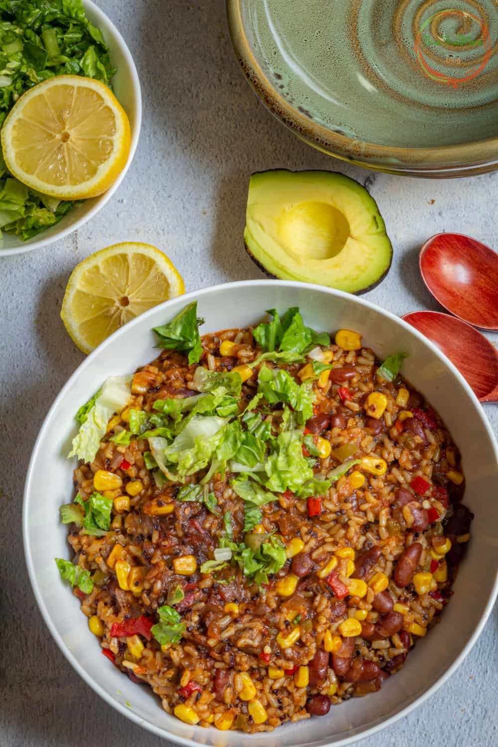Instant Pot Vegan Burrito Bowl with avocados on the side.