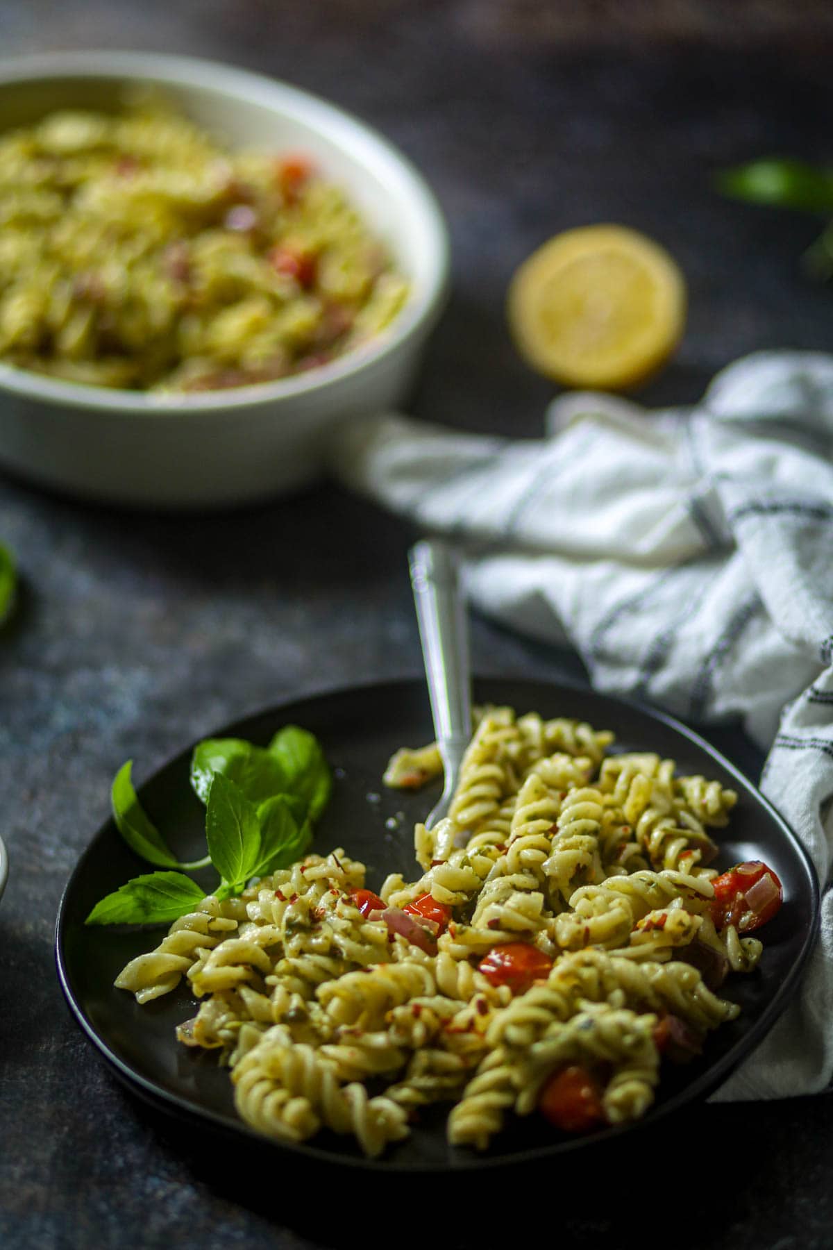 Vegan Pesto Pasta in a black plate.