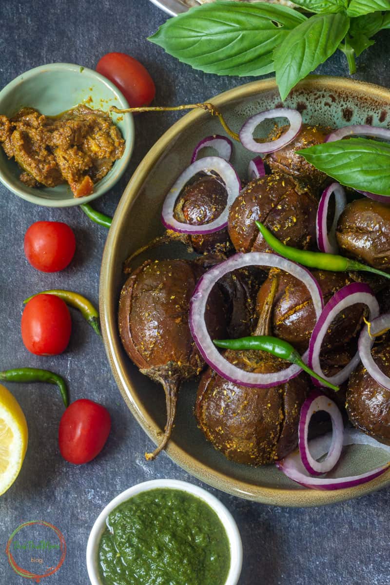 Bharwa Baingan garnished with some sliced onions.