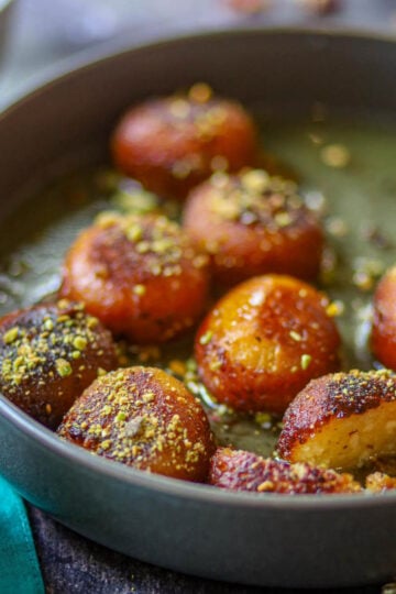 Homemade gulab jamun made with khoya.