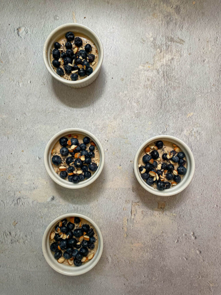 Top the pan with some blueberries or any other fruits along with some nuts