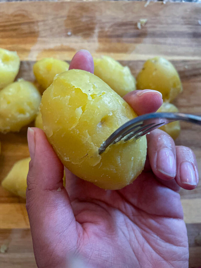 pork potatoes with fork