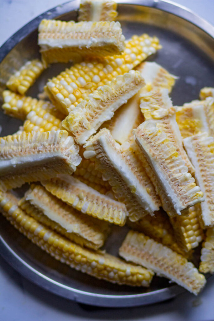 place all the corn ribs in a bowl