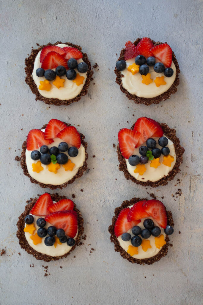 top the tart with fresh fruits and serve