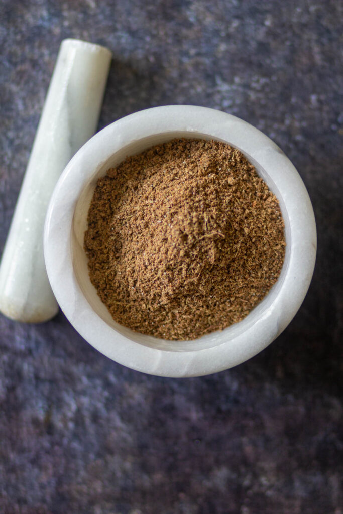chai masala in a white bowl.