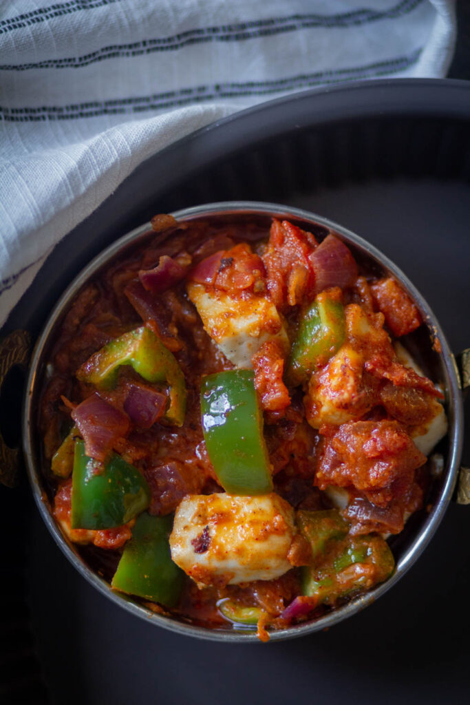 closeup shot of kadai paneer in a wok