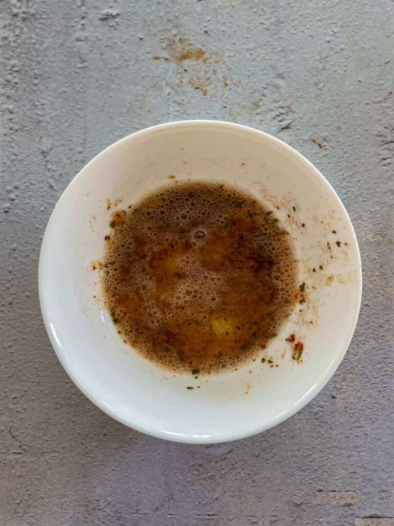 make egg wash by whisking egg whites with spices