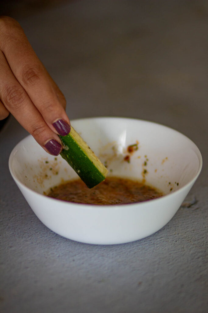 dip zucchinis in the egg wash
