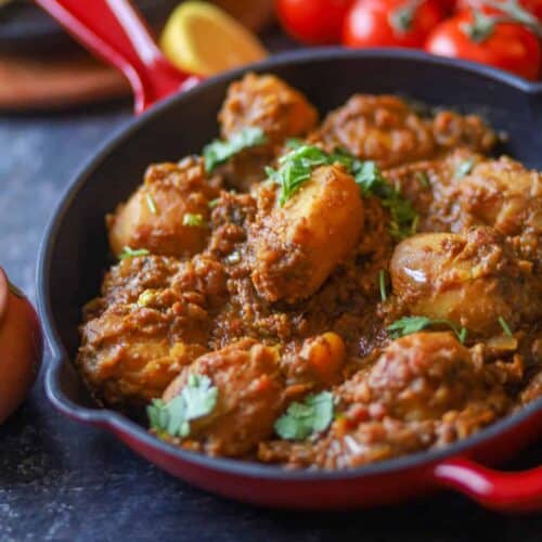 Punjabi Dum Aloo Recipe served in a red cast iron skillet.