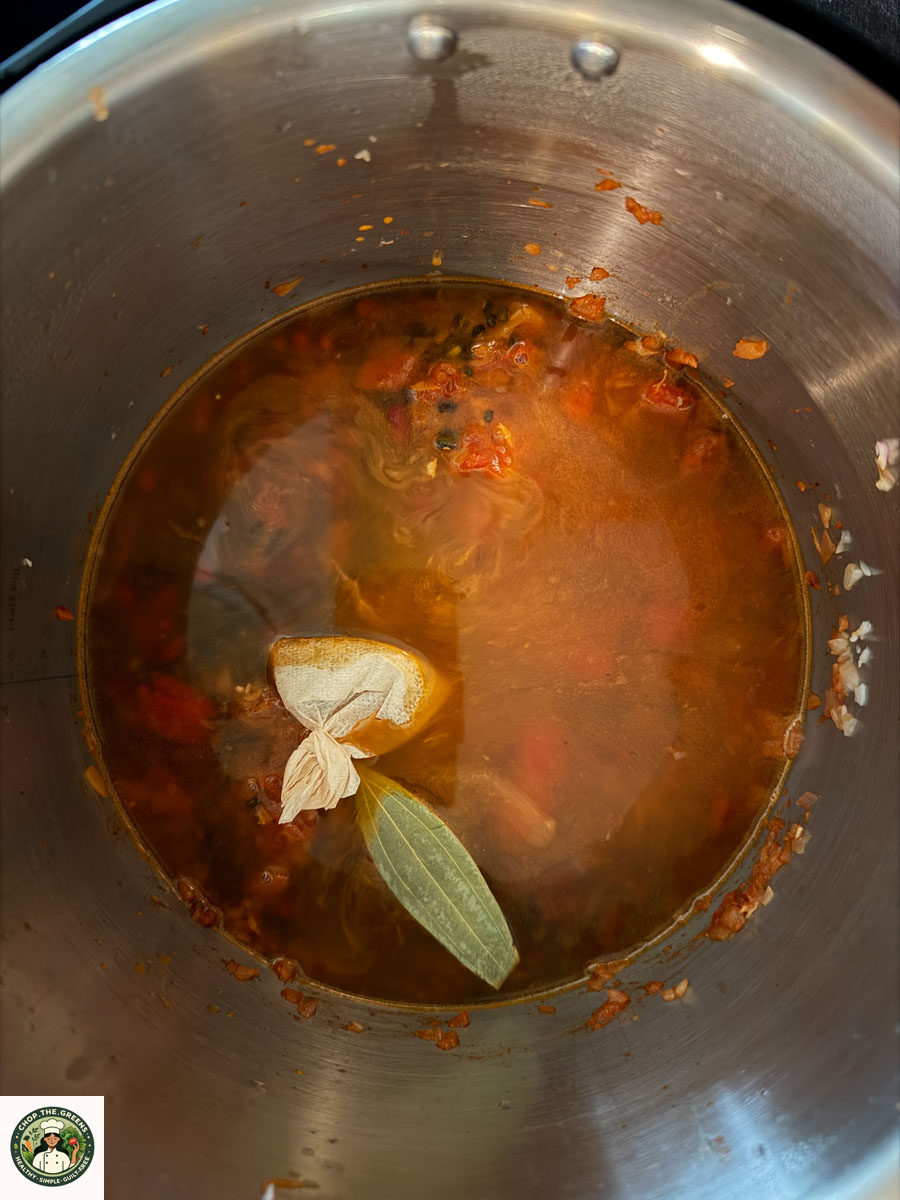 Water and whole spices added to Instant Pot Dal Makhani.
