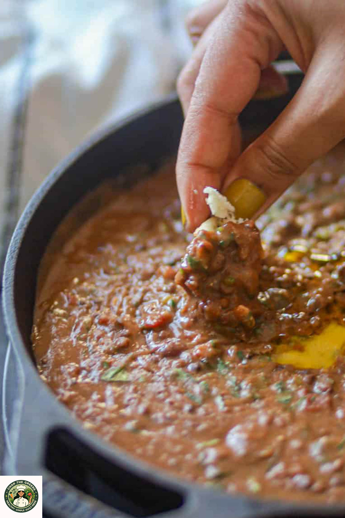 Naan dipped into creamy Instant Pot Dal Makhani.