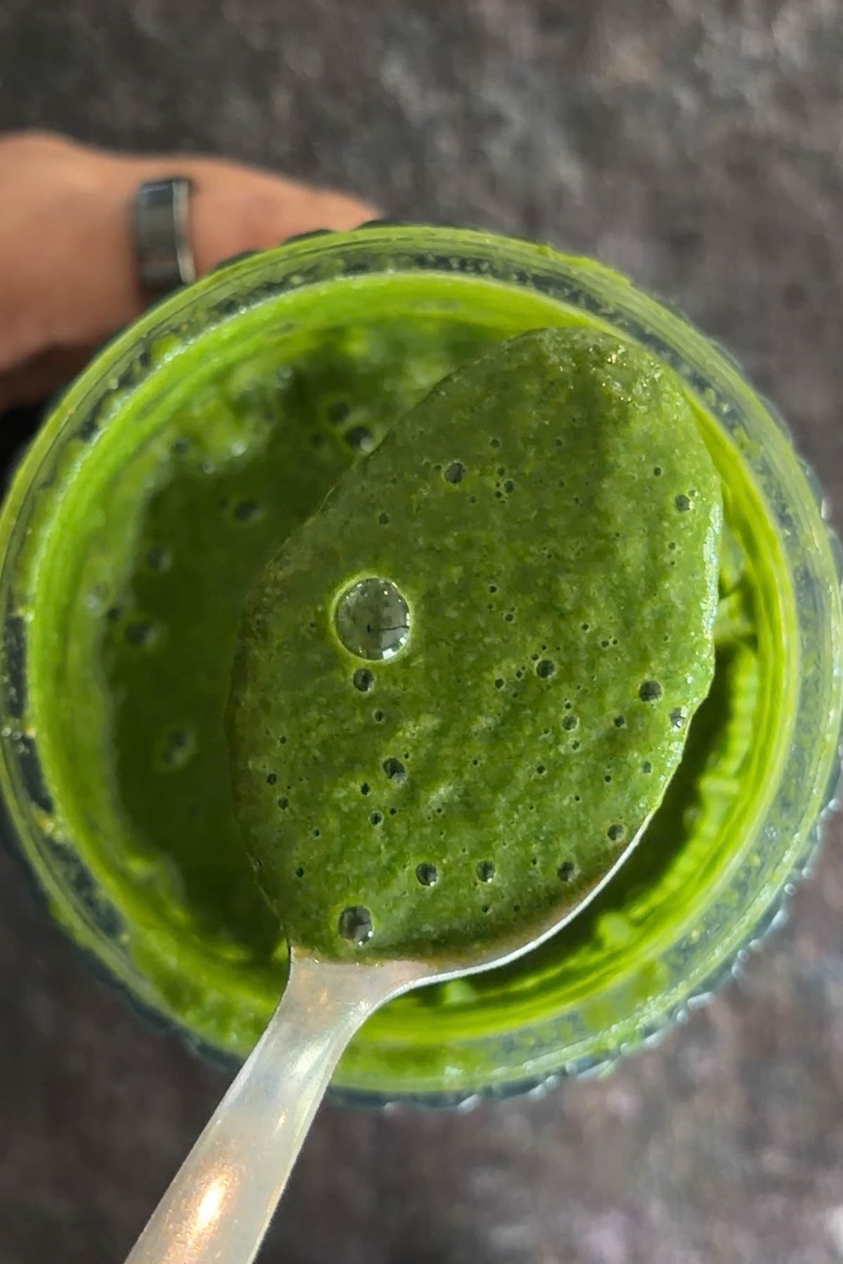 Freshly blended bright green cilantro mint chutney.