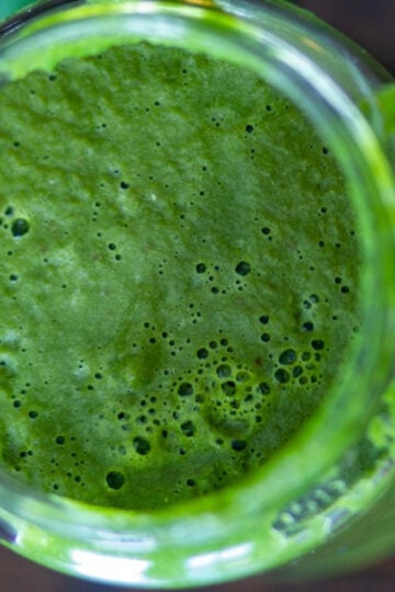 Close-up of bright green cilantro mint chutney.