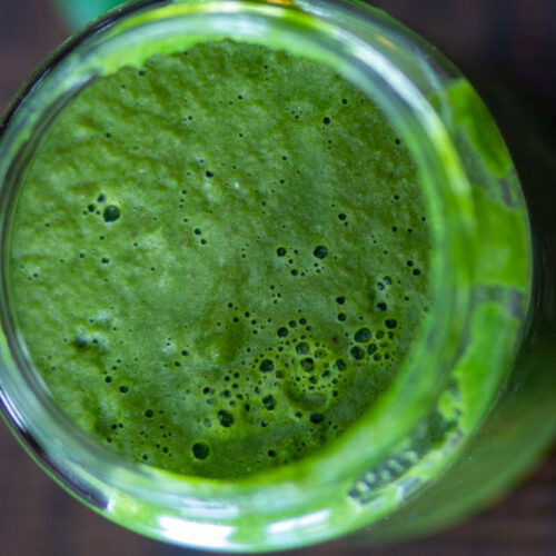 Close-up of bright green cilantro mint chutney.