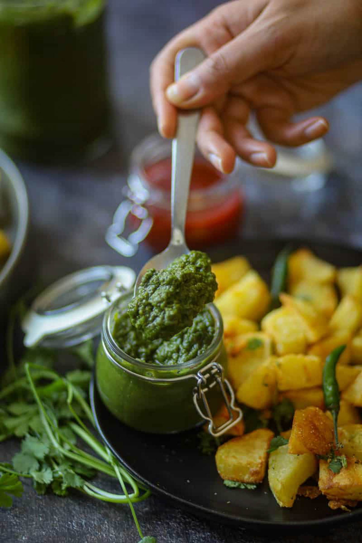Spoonful of thick green chutney.