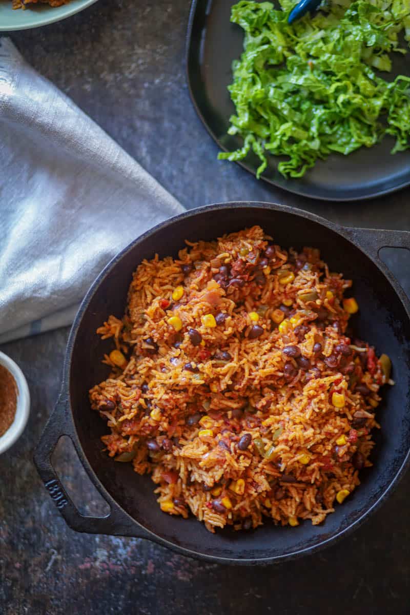 vegan burriot bowl served in a black wok.