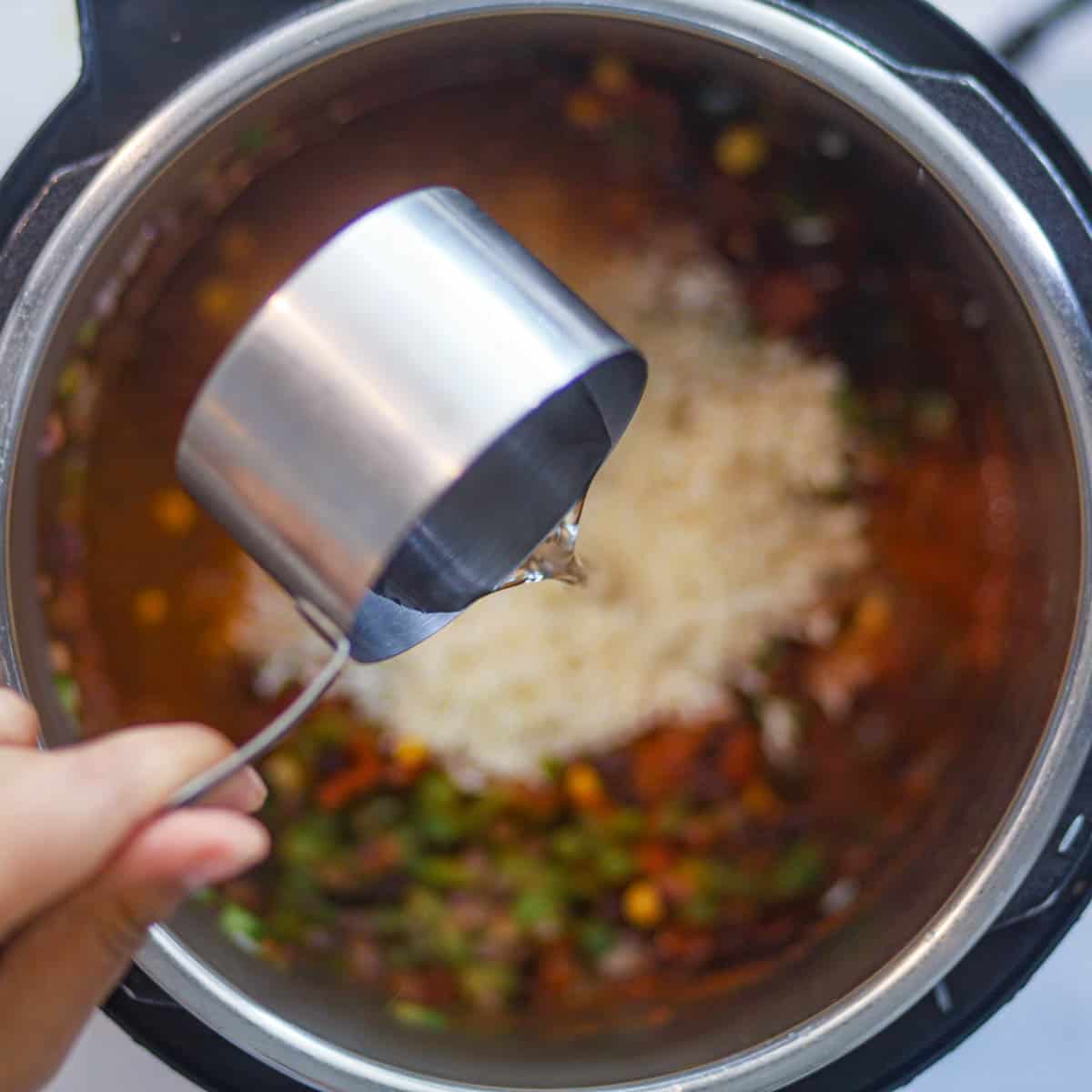 add water & de-glaze the pot.
