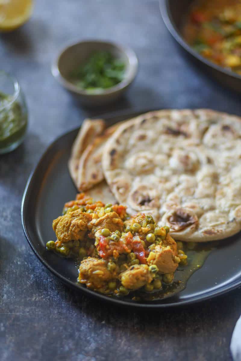 Soya Chunks Curry served on a plate with roti.