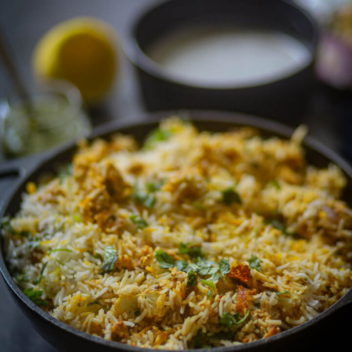 Paneer Biryani Recipe served in a black wok.