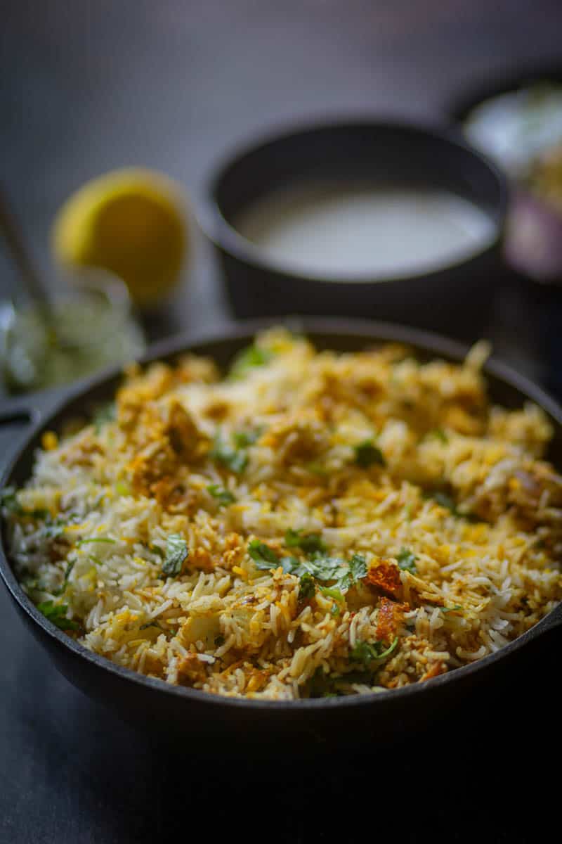 Paneer Biryani Recipe served in a black wok.