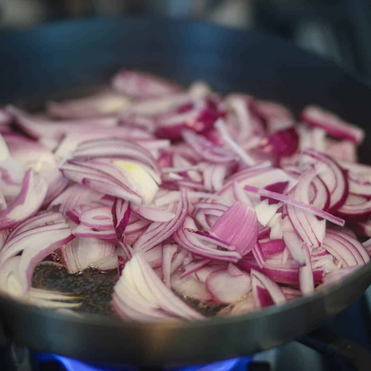 Add onions in a pan.