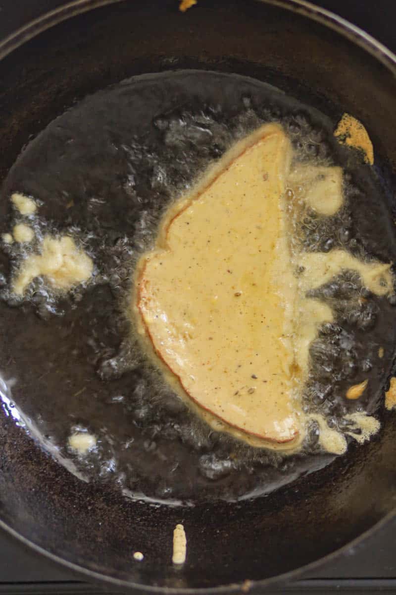 Drop the bread in the Kadai and fry,