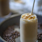 Caramel Iced Coffee served in a tall glass.