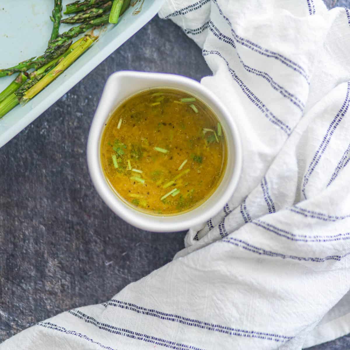 Whisk all the ingredients of lemon vinaigrette until well combined.