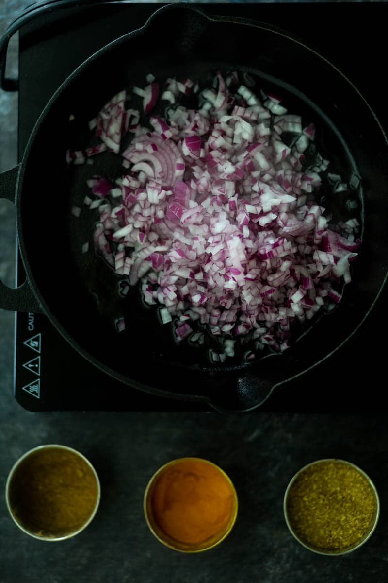 Add onion in a skillet.