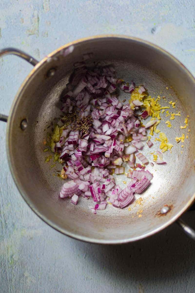 Then add chopped onions.