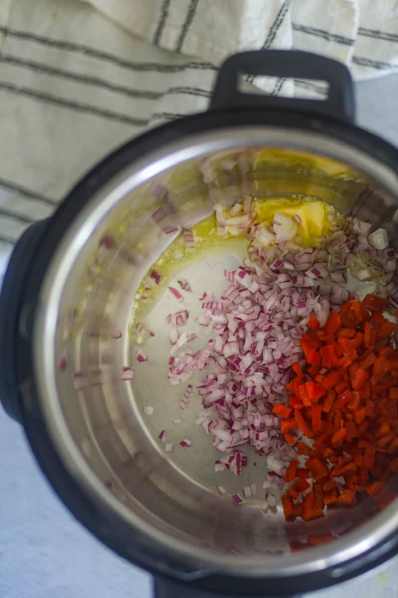 Saute onions and pepper until tender.